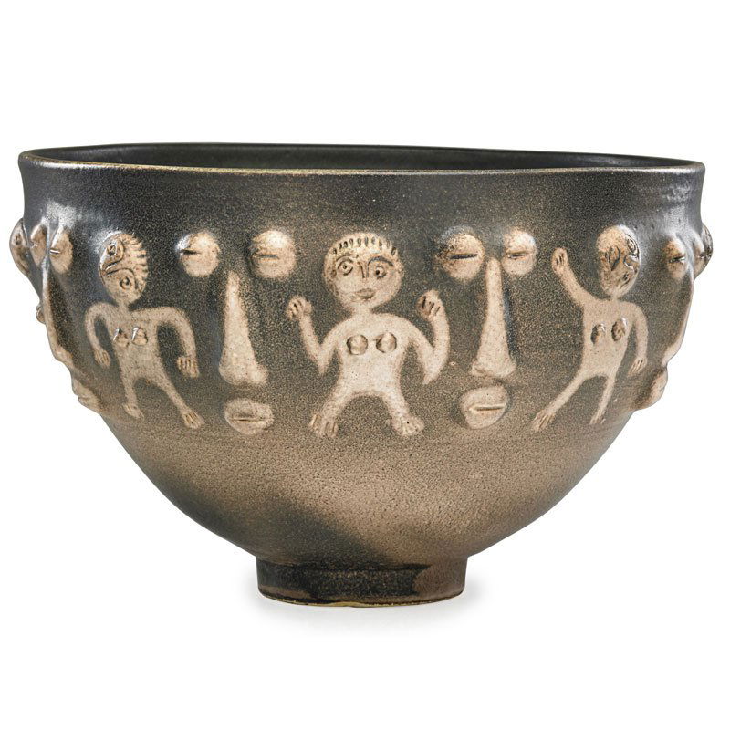 SCHEIER Footed bowl: EDWIN SCHEIER (1910 - 2008);MARY SCHEIER (1908 - 2007);Glazed earthenware footed bowl with stylized figures and faces, black and brown glaze, Green Valley, AZ, 1998; Signed and dated; 7 1/4" x 11 1/4"