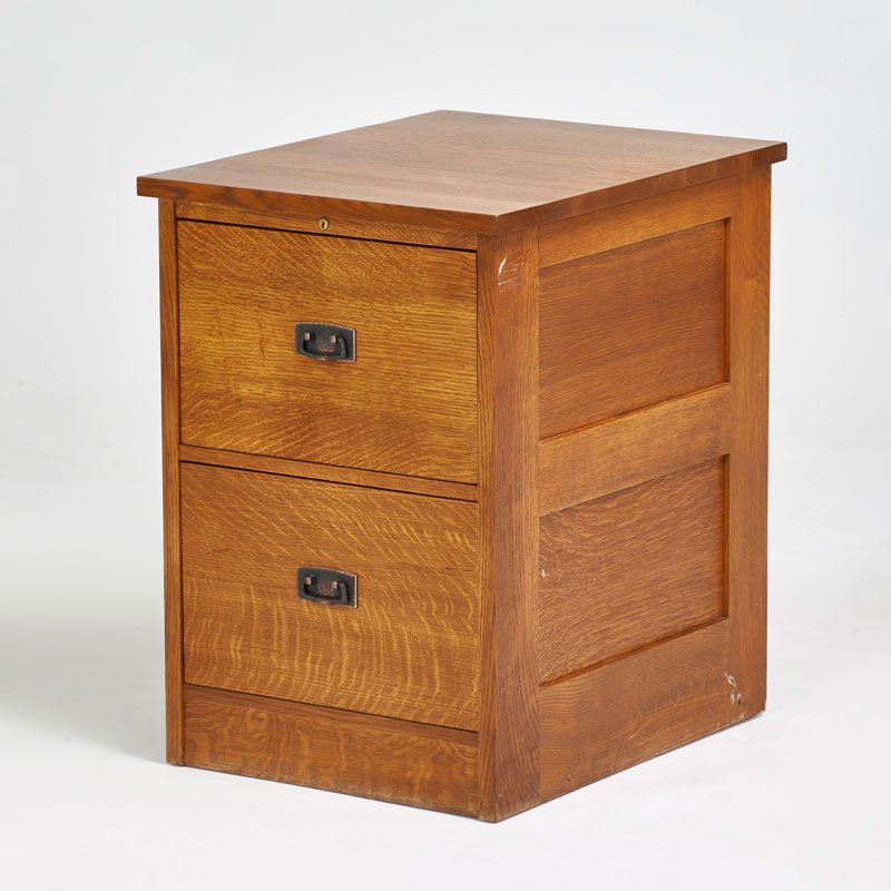 STICKLEY BY E.J. AUDI: Contemporary arts and crafts style two-drawer file cabinet, Manlius, NY, ca. 1990; Quartersawn oak, patinated metal; Metal tag and branded mark; 31" x 22 1/4" x 28"