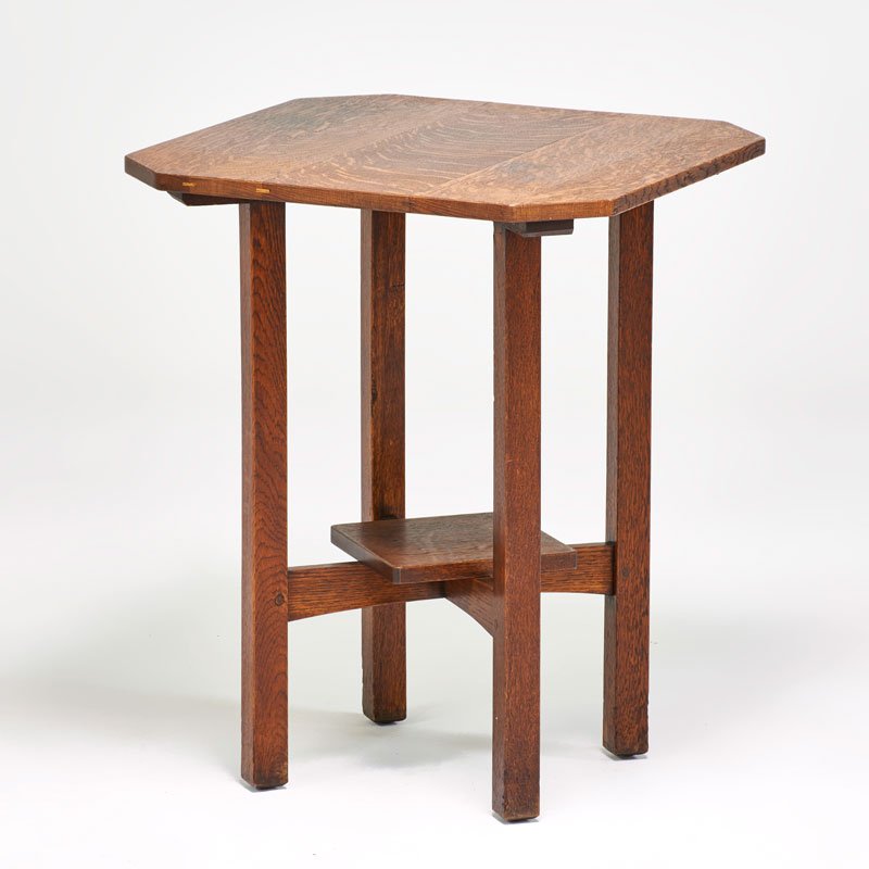 L. & J. G. STICKLEY: Clip corner lamp table with inset lower shelf, Fayetteville, NY, 1910; Quartersawn oak; "Work of..." label; 29 1/4" x 23 1/4" x 24"