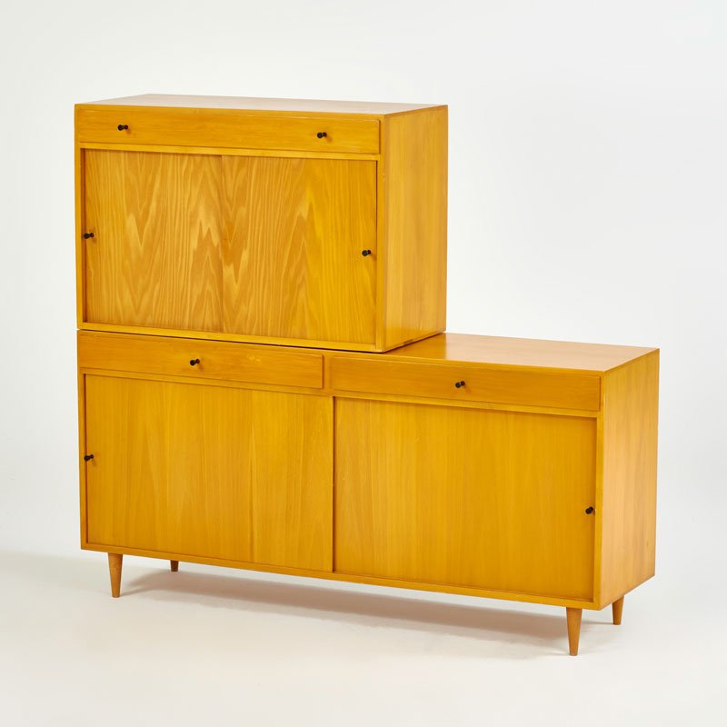 STYLE OF PAUL McCOBB: Two cabinets, USA, ca. 1960; Blond wood, enameled metal; Unmarked; Long: 29 1/2" x 60 1/2" x 17 1/2", short: 24" x 36" x 17 1/2"