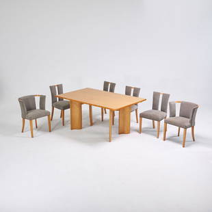 ELIEL SAARINEN; JOHNSON FURNITURE CO.: Dining table and six chairs: two arm-, four side-, USA, ca. 1940; Bleached hardwood and plywood, upholstery, brass tacks; Unmarked; Table: 30" x 65" x 40", arm: 29 1/2" x 24" x 21", side: 33" x 19" x