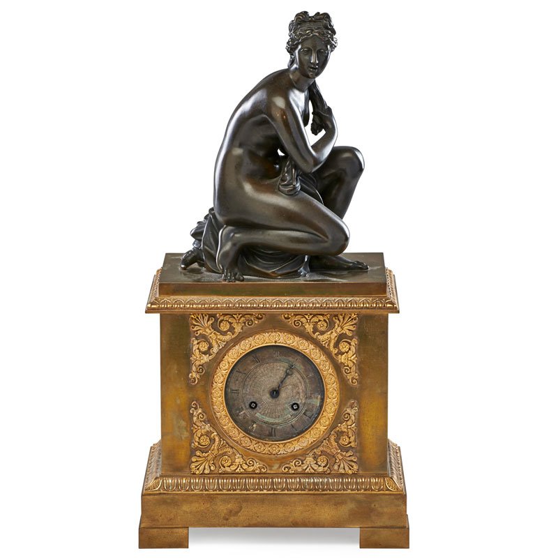 EMPIRE GILT AND PATINATED BRONZE MANTEL CLOCK: Cast with Venus seated on a turtle with patinated base, ca. 1810; 23 1/4" x 12" x 8 1/4"