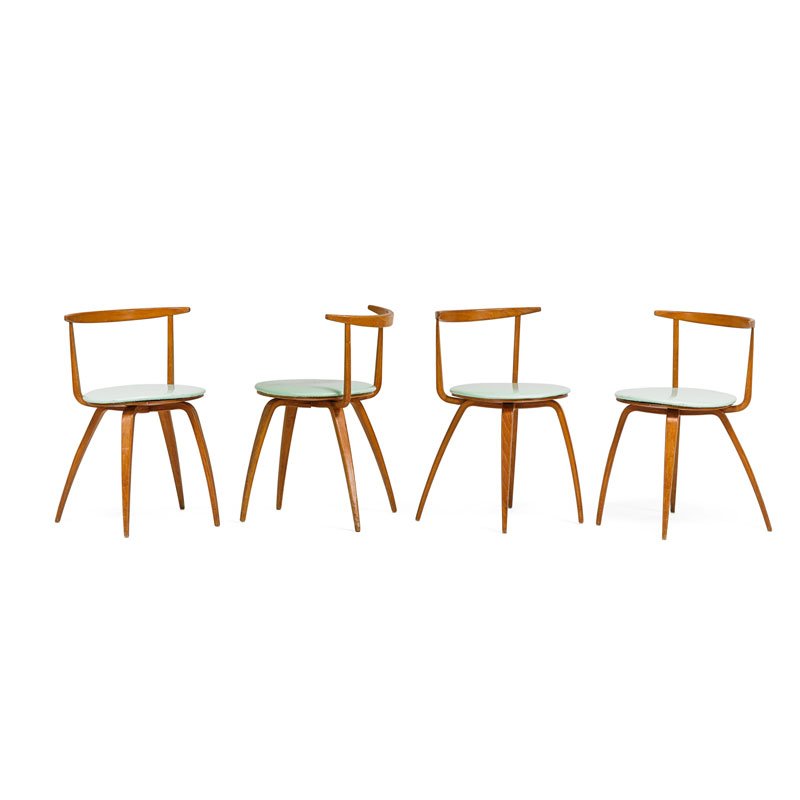 GEORGE NELSON; HERMAN MILLER Four Pretzel chairs: GEORGE NELSON (1908 - 1986) HERMAN MILLER Four Pretzel chairs, Zeeland, MI, 1950s Laminated bent plywood, vinyl Unmarked 29 1/2" x 19 1/2" x 19"