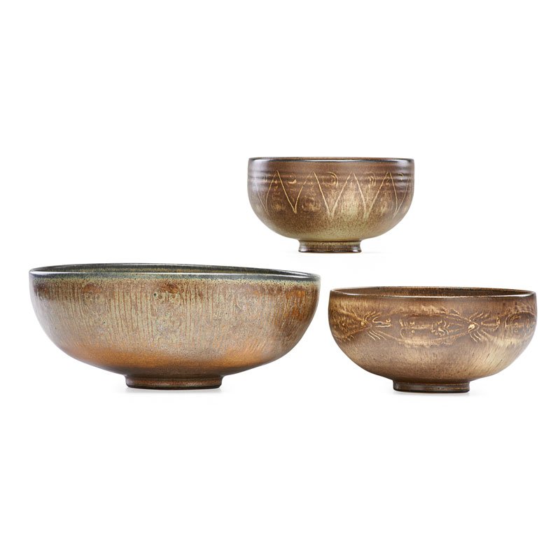 SCHEIER Three early bowls: EDWIN SCHEIER (1910 - 2008) MARY SCHEIER (1908 - 2007) Three early bowls with fish, figures, and geometric decoration, New Hampshire, 1950s-60s All signed 3 3/4" x 7 3/4", 3 3/4" x 6 1/2", 4 1/2" x 10