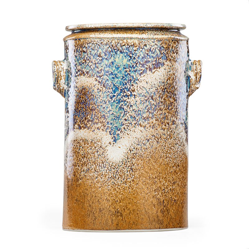 BROTHER THOMAS BEZANSON Massive vessel: BROTHER THOMAS BEZANSON (1929 - 2007) Tall oval porcelain vase with lugs, textured iron glaze, Weston, VT Incised ichthys symbol 17 3/4" x 12 1/2" Provenance: Pucker Gallery, Boston, MA