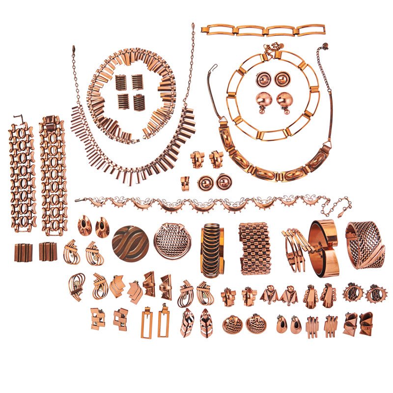 COLLECTION OF RENOIR OR REBAJE COPPER JEWELRY: Comprising 65 pieces in geometric motifs, including 25 pairs or earrings, five necklaces, two open cuffs, three hinged cuffs, three link bracelets, and two brooches. Pieces of note include: Rebaje rec