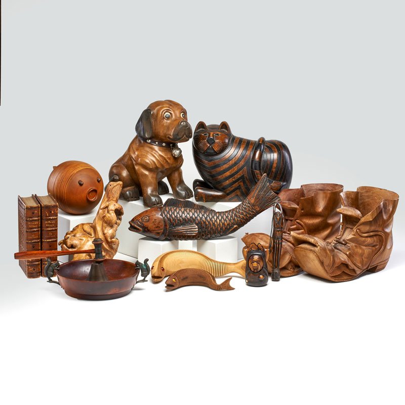 WOOD GROUP: Thirteen pieces including a pair of carved boots, carved figural animals, nut cracker, etc., together with two leather bound books with gilt-edged pages from IRVING'S WORKS, Vol. V COLUMBUS and Vol. X