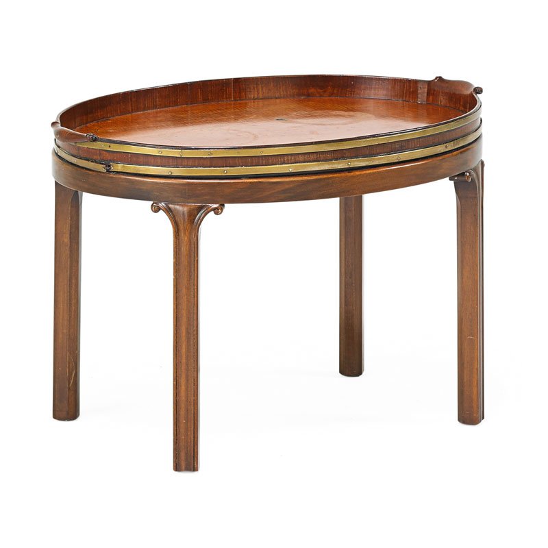 GEORGE III MAHOGANY TRAY TABLE: Brass bound oval tray on later stand, England, 19th/20th c.; 20" x 30" x 20 3/4"