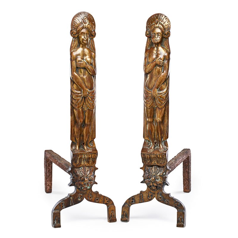 PAIR OF FIGURAL BRONZE AND IRON ANDIRONS: Each feature a bronze figure wearing a headdress and loin cloth, clutching their chest, standing above text "E 1560 R", mounted to iron frames, Continental, 19th c.; 33" x 10 1/2" x 20 1/2"