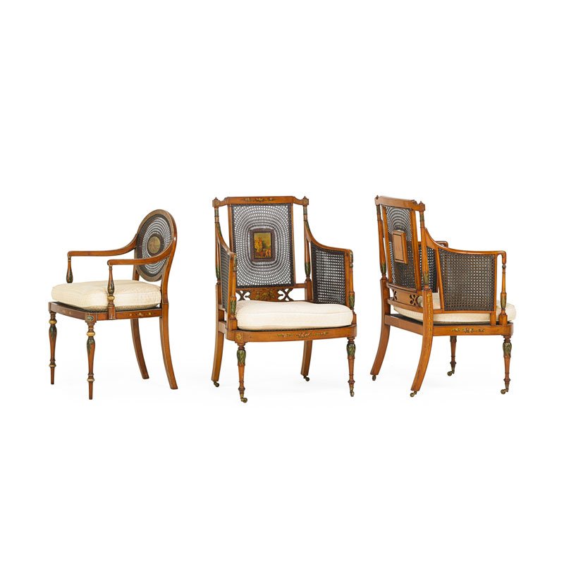 ASSEMBLED SET OF THREE EDWARDIAN ARM CHAIRS: Paint decorated with cane backs and upholstered seats, England, early 20th c.; Largest: 38 1/2" x 25 1/2" x 20"