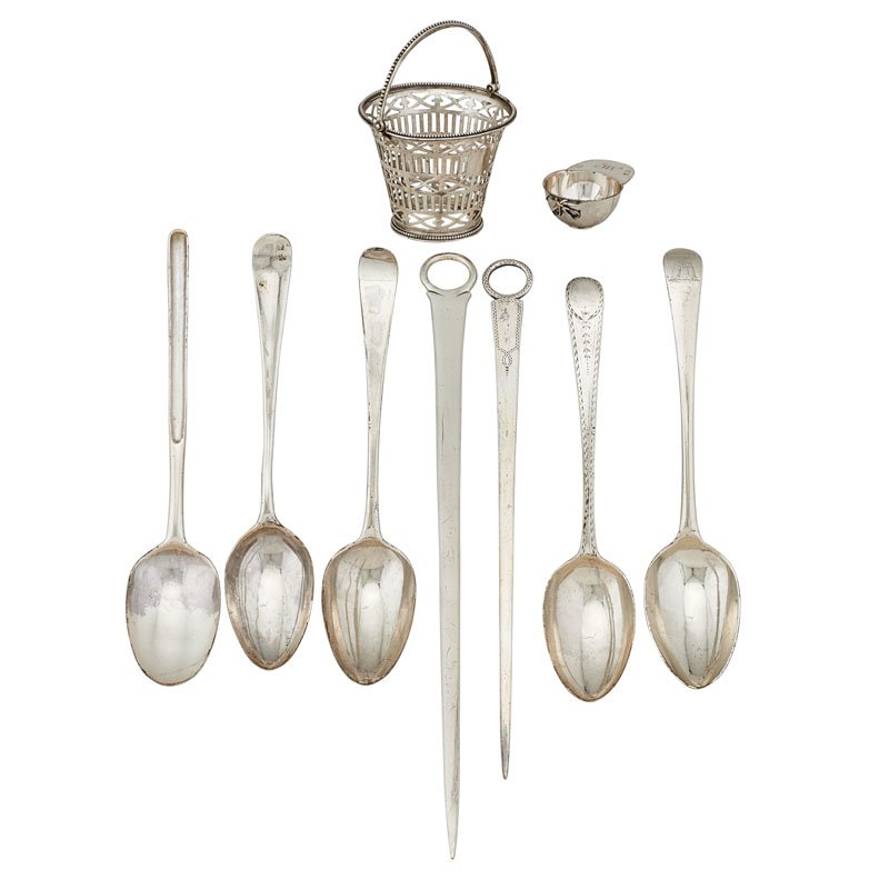 HESTER BATEMAN SILVER: Nine: Two meat skewers, four serving spoons, one marrow spoon, one reticulated basket, and one trinket in the form of an equestrian helmet, England, late 18th c.; Marked; Meat skewer: 13 3/4" long; 16