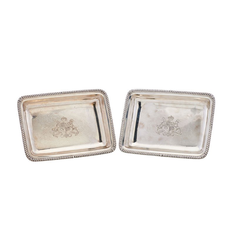 PAIR OF PAUL STORR STERLING SILVER DISHES: Each rectangular dish features gadrooned edges and central coat of arms, London, 1813; Marked; 2" x 12 1/2" x 9 1/4"; 56.9 OT