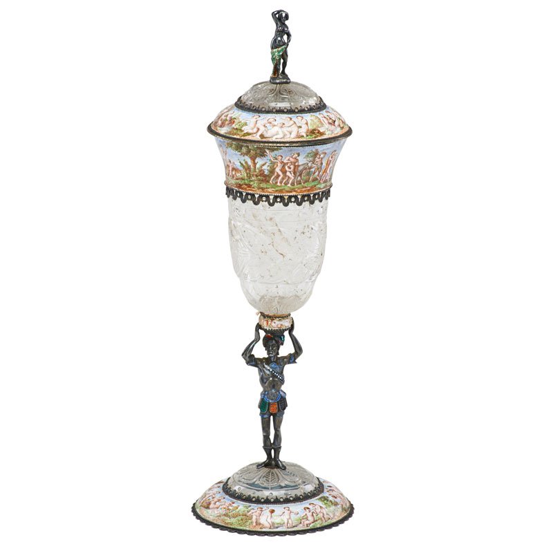 VIENNESE ROCK CRYSTAL POKAL: Enamel silver mounted lidded cup with figural blackamoor stem and finial, Austria, 19th c.; 11 1/4" x 3 1/2"