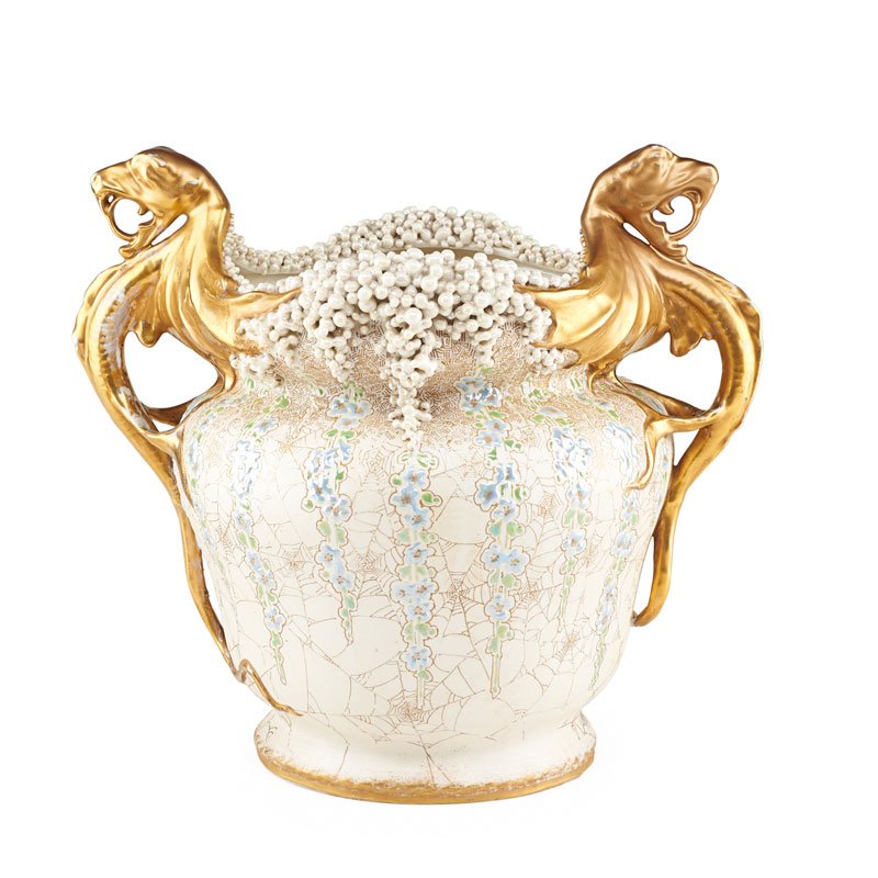 AMPHORA POTTERY JARDINERE: Featuring two gilt dragon handles with bunches of pearls along the lip, opalescent floral vines hanging down, and spider webs in between, Austria, ca. 1900; Marked; 13 1/4" x 15"