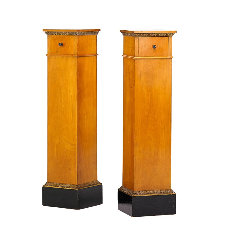 PAIR OF PARCEL GILT BIRCH PEDESTAL CABINETS: Parcel gilt pedestals with ebonized base, Austria, late 19th/early 20th c.; 49" x 11 1/4" x 10 5/8"
