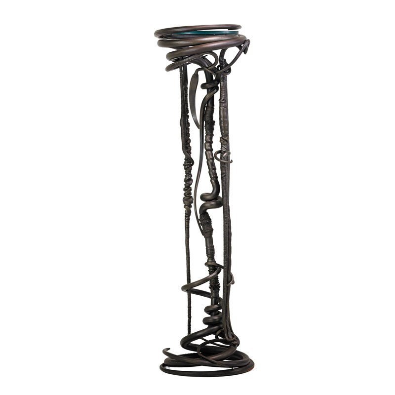 ALBERT PALEY Fine plant stand: ALBERT PALEY (b. 1944) Fine and large plant stand, Rochester, NY, 1983 Forged, fabricated, and blackened steel, glass Stamped PALEY 1983 57 1/2" x 15" Provenance: Collection of Jerome Shaw, Florida Ra