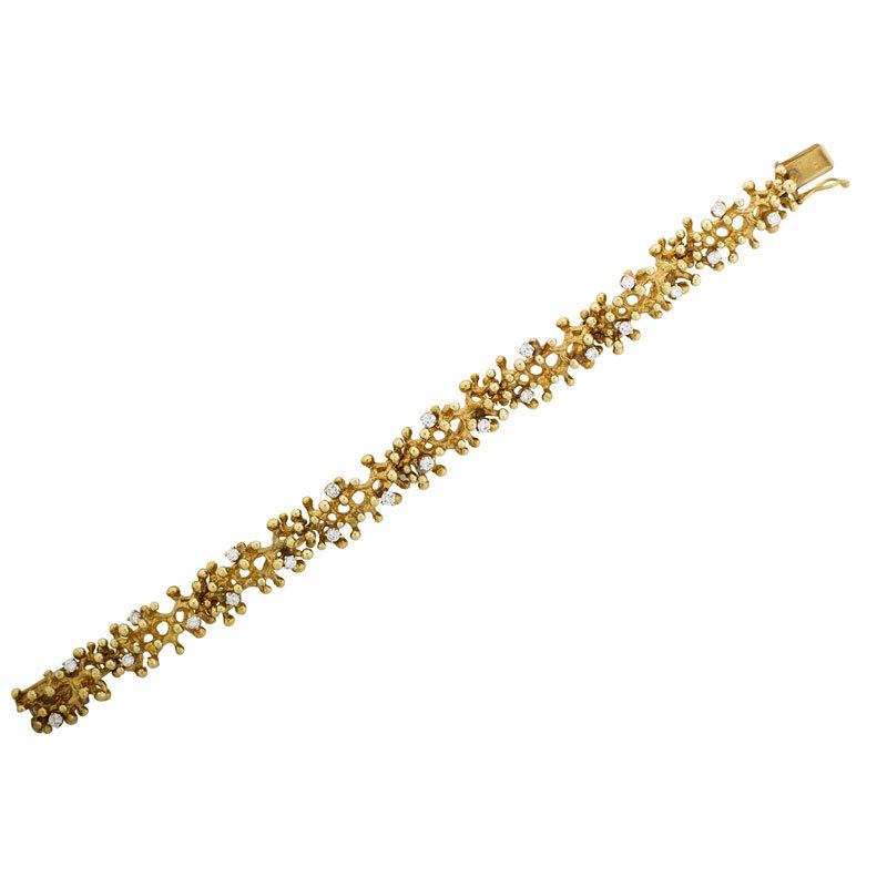 ED WIENER Fine bracelet: Fine bracelet, New York, after 1966 18k and 14k gold, approx. 1 ct. TW diamonds throughout Stamped ED WIENER 18K/14K 6" long, 19.6 dwt.