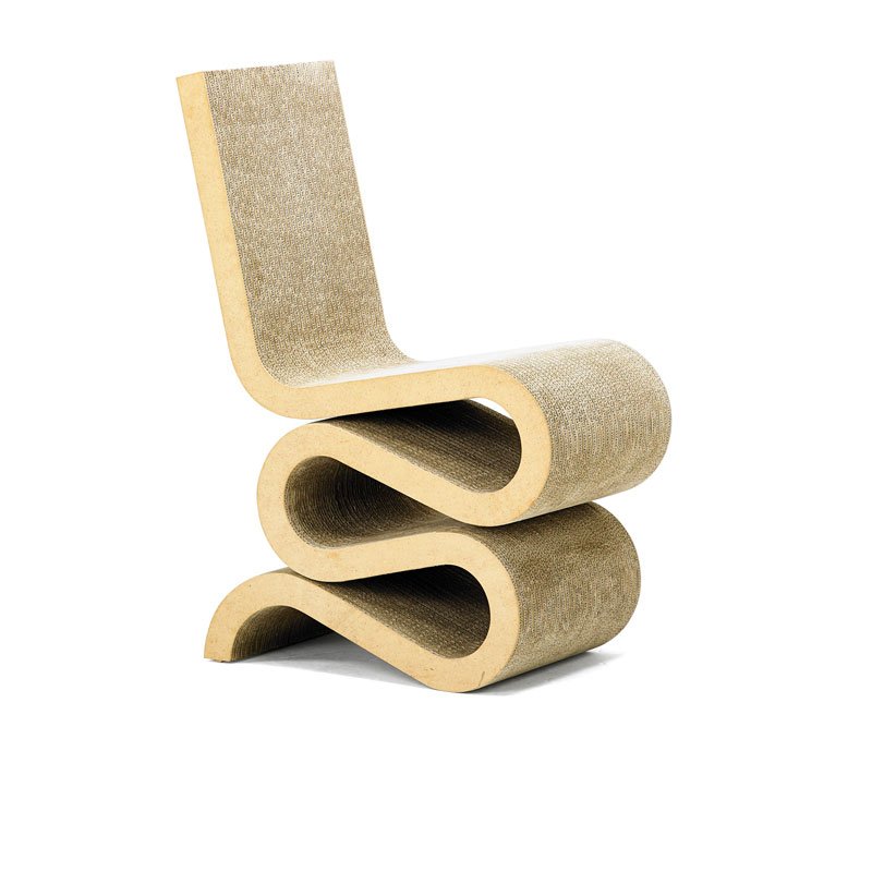 FRANK GEHRY; VITRA WIGGLE CHAIR: Laminated cardboard and masonite, USA, 1990s Vitra label 31 1/2" x 13" x 24"