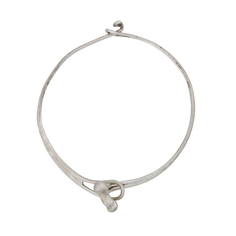 EARLY, RARE ELSA PERETTI STERLING "BONE" COLLAR: A biomorphic design in two curved parts. Ca. 1972. Marked Peretti, sterling. 15". 54.2 gs.