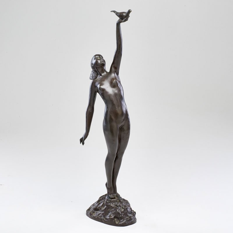 AFTER PIERRE LE FAGUAYS (1892-1962): Message of Love," bronze sculpture of a woman holding a dove, France; Signature and foundry mark of Susse Freres, Paris; 21 1/2