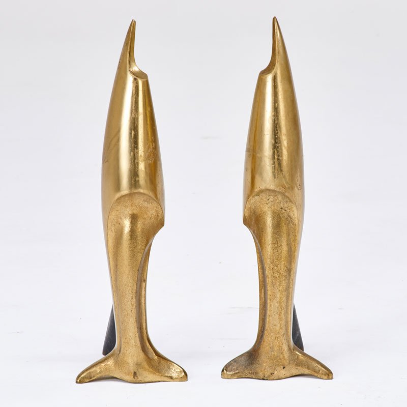 STYLE OF PIERRE LEGRAIN: Pair of andirons; Cast brass, iron; Unmarked; Each: 20 1/2" x 6 1/2" x 8"