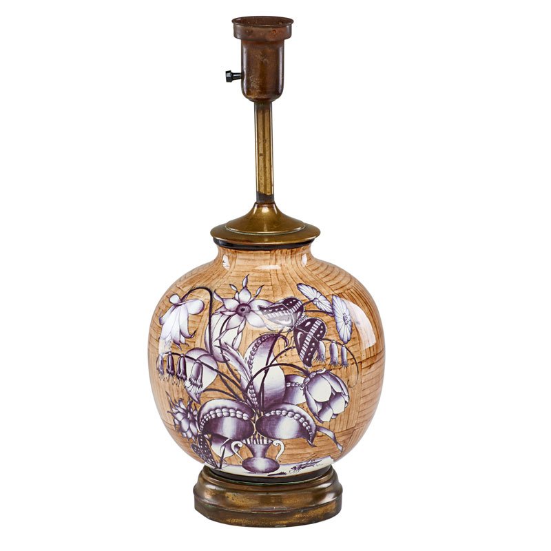 GIO PONTI; GINORI: Glazed porcelain table lamp decorated with floral still life and insects on faux bois ground, Italy, ca. 1950s; Brass washed fittings; Marked with Gio Ponti signature and Rochard Ginori ink stamp; 21