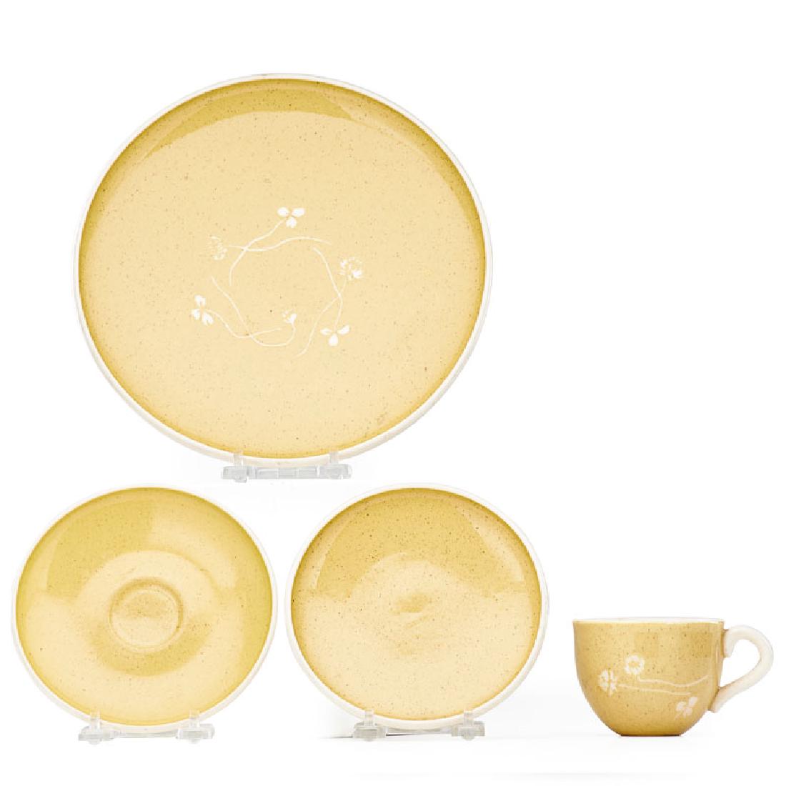 RUSSEL WRIGHT White Clover Harkerware, 4 pcs: RUSSEL WRIGHT (1904 - 1976) HARKER POTTERY CO. Four pieces of White Clover Harkerware, East Liverpool, OH, 1950s: dinner plate, bread plate, cup, and saucer Three stamped HARKERWARE by Russel Wright,