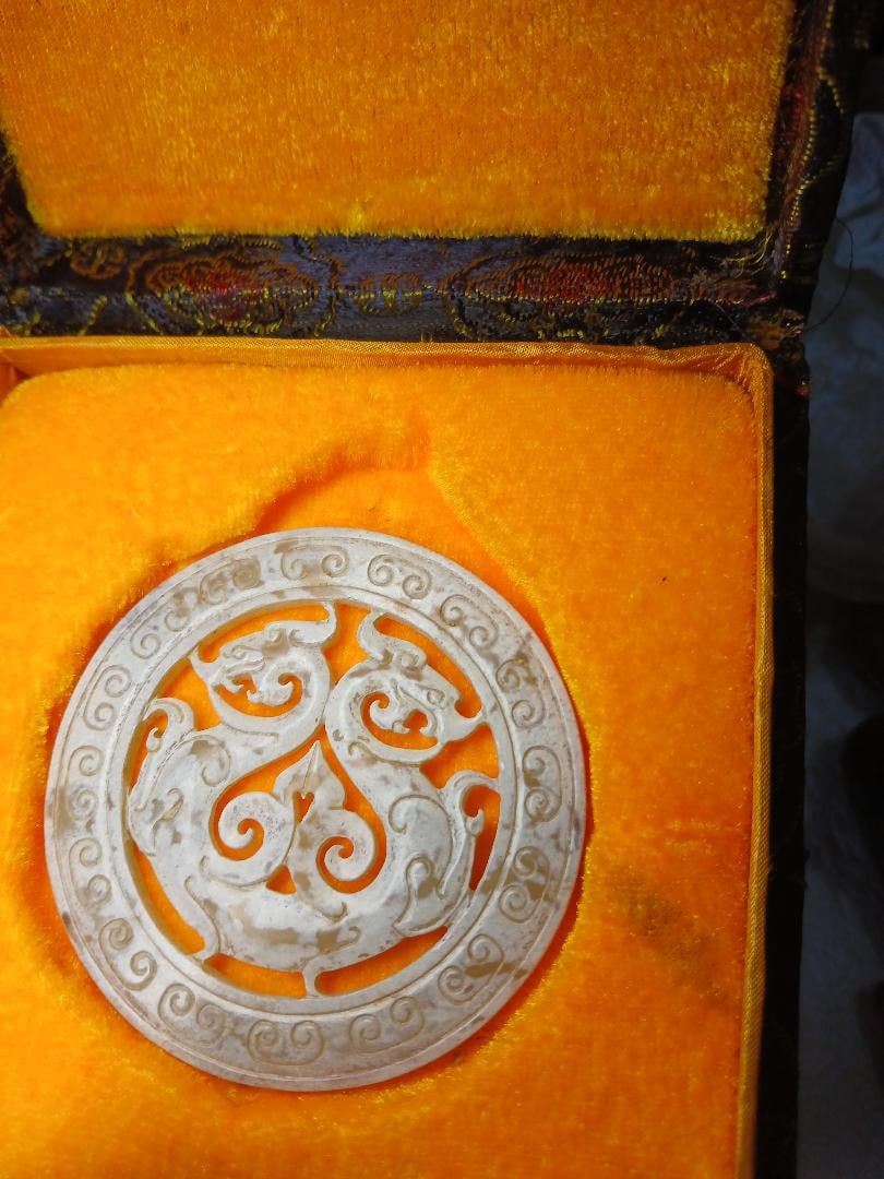 Elegant Han Dynasty White Jade Carving of a Circular Pendant (1 of 3)