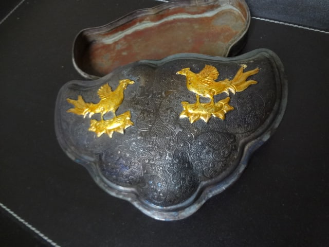 Tang Dynasty Silver gilt Perfume Box with Phoenix Motifs: This is an elegant silver gilt perfume box with phoenix motifs.