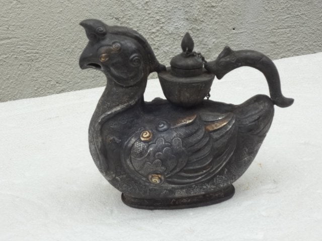 Tang Dynasty Silver Gilt Duck with Stamping: This is an elegant silver gilt duck with hand stamping.
