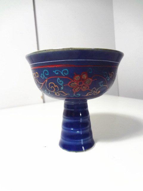 Very Rare Ming Dynasty Sapphire Blue Imperial Stem Bowl: H 3 1/2 in., diameter 3 1/2 in. This was a very rare stembowl of the Ming Dynasty (15th Century). It was decorated with a sapphire blue glaze all over the body. In the middle of the cup, it was painte