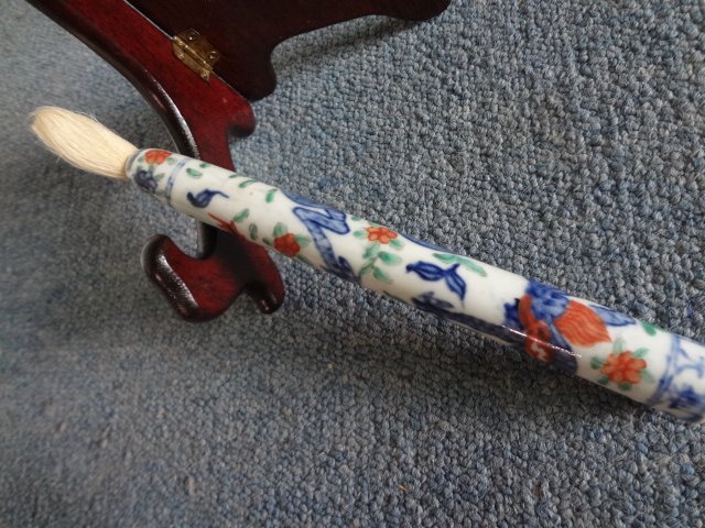 Rare Ming Dynasty Brush with Dragon of Wanli Emperor: L 8 1/4 in. This was an imperial paint brush for the Wanli Emperor because only the Emperor could use the dragon symbol. It was decorated with five color dragon and floral motifs. Six Chinese characte