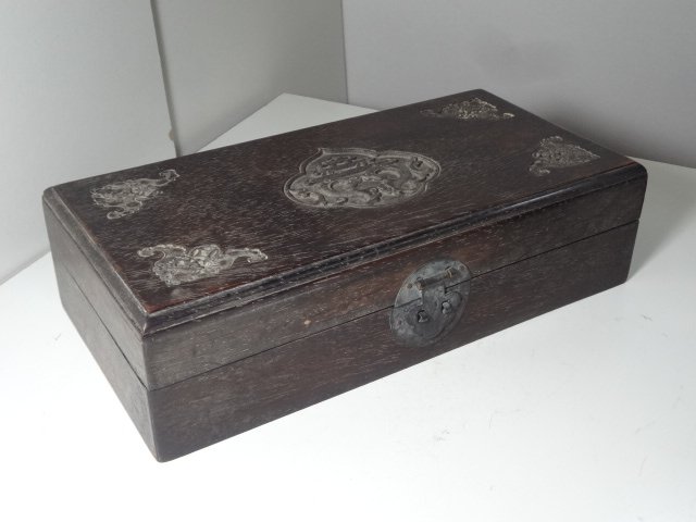 Qing Dynasty Zitan Wooden Box with Bat & Coin: L 11 3/4 in., W 5 3/4 in., H 3 in. This zitan box was used as a letter box during the Qing Dynasty. The letter was put inside and sealed, then the letter was delivered by hand to the receiver. The box