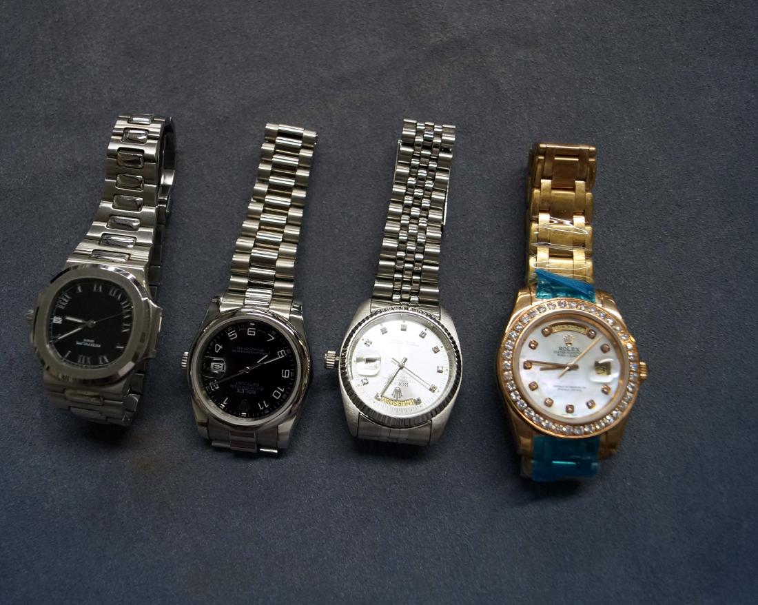LOT (4) ASSORTED STAINLESS REPLICA WRISTWATCHES (1 of 1)