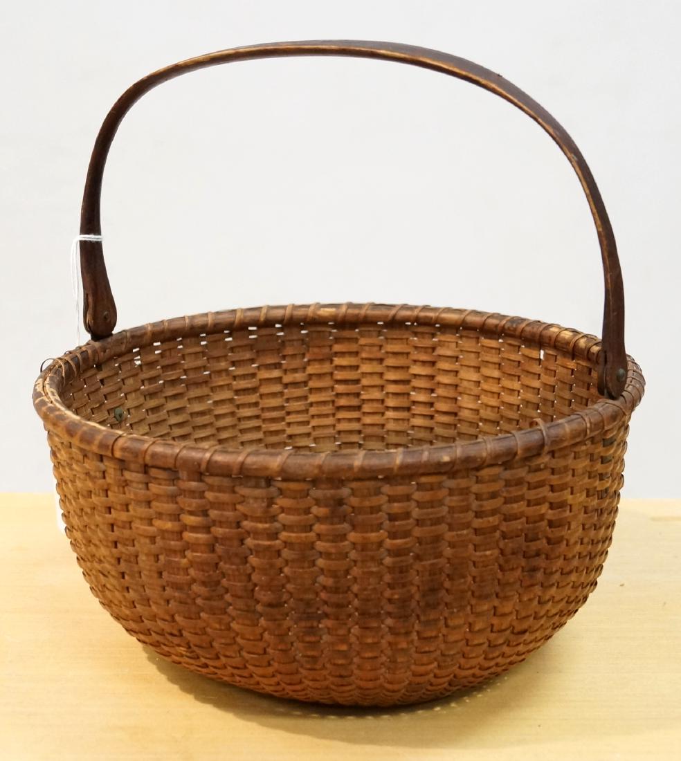 VINTAGE NANTUCKET BASKET WITH SWING HANDLE. HEIGHT 9"; (1 of 3)