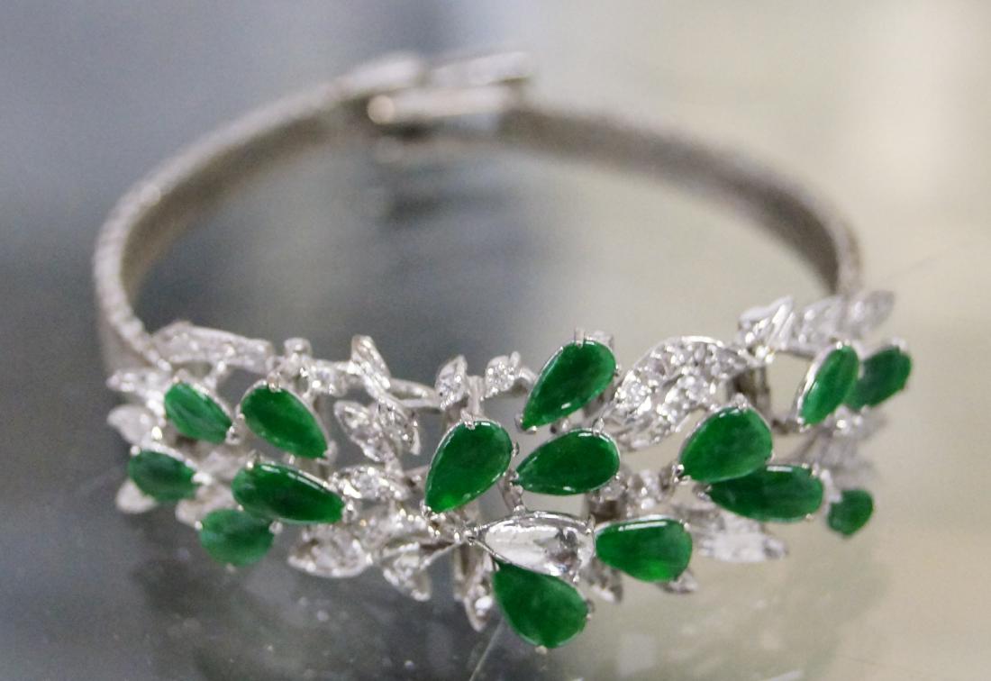 GILT METAL, DYED GREEN JADE AND DIAMOND BRACELET WITH: GILT METAL, DYED GREEN JADE AND DIAMOND BRACELET WITH SILVER HERRINGBONE CHAIN BRACELET. LENGTH 7" (MISSING 1/STONE)
