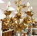 FRENCH STYLE GILT METAL CHANDELIER. HEIGHT 24";