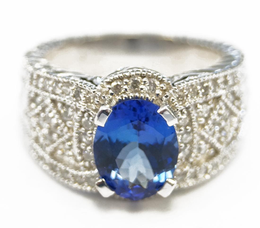 14K WHITE GOLD, TANZANITE AND DIAMOND RING, TANZANITE: 14K WHITE GOLD, TANZANITE AND DIAMOND RING, TANZANITE APPROXIMATE 2.03 CTS; DIAMOND APPROXIMATE TWT 0.40 CT. RING SIZE 7; GROSS WEIGHT 9.75 GRAMS (WITH APPRAISAL)