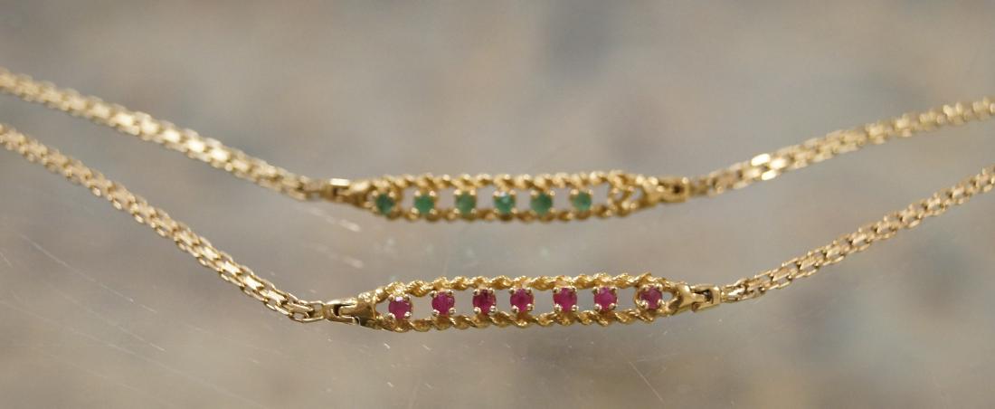 PAIR 14K YELLOW GOLD, RUBY AND EMERALD CHAIN BRACELETS.: PAIR 14K YELLOW GOLD, RUBY AND EMERALD CHAIN BRACELETS. LENGTH 7 1/2"; GROSS WEIGHT 5.87 GRAMS