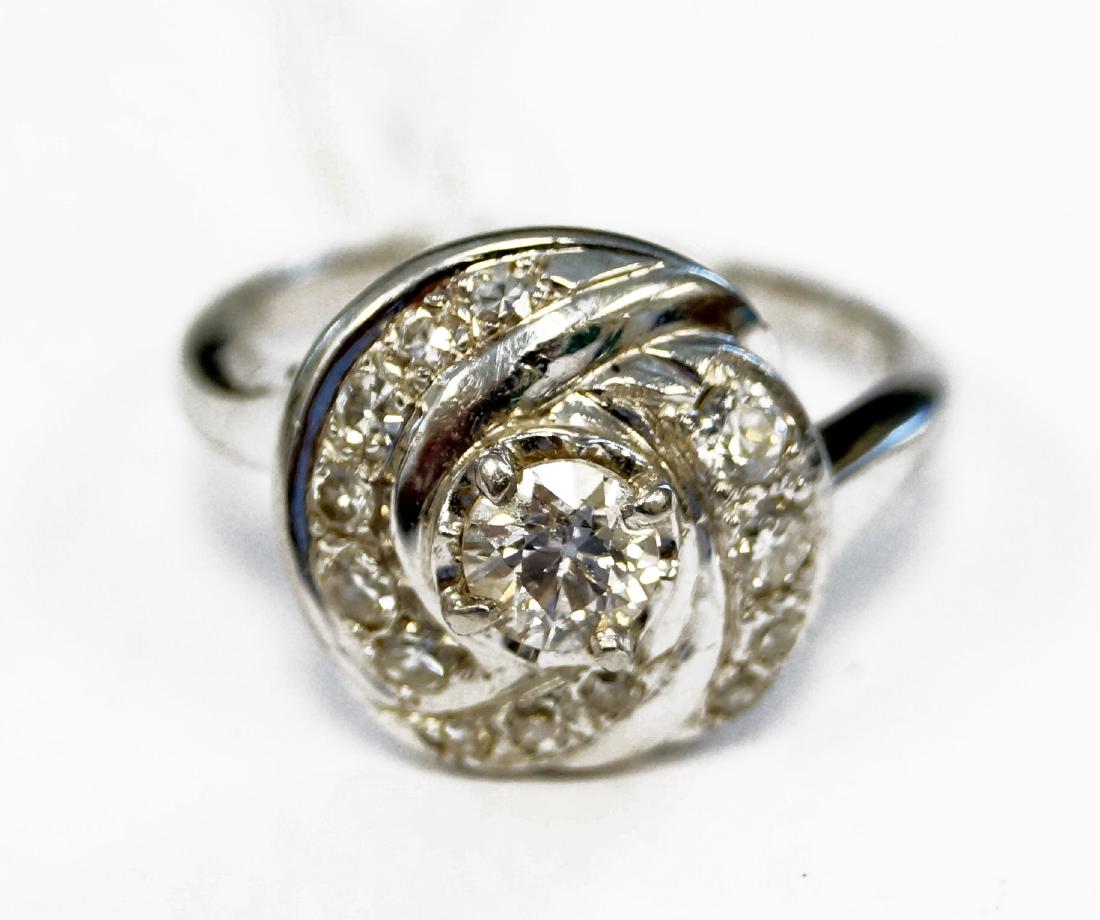 18K WHITE GOLD "ORANGE BLOSSOM" EUROPEAN-CUT DIAMOND: 18K WHITE GOLD "ORANGE BLOSSOM" EUROPEAN-CUT DIAMOND RING, CENTERING A DIAMOND WEIGHING APPROXIMATELY 0.42 CT WITH (13) SINGLE AND FULL CUT 1.5-2.5MM DIAMONDS. RING SIZE 6 1/2; GROSS WEIGHT 4.89 GRAMS