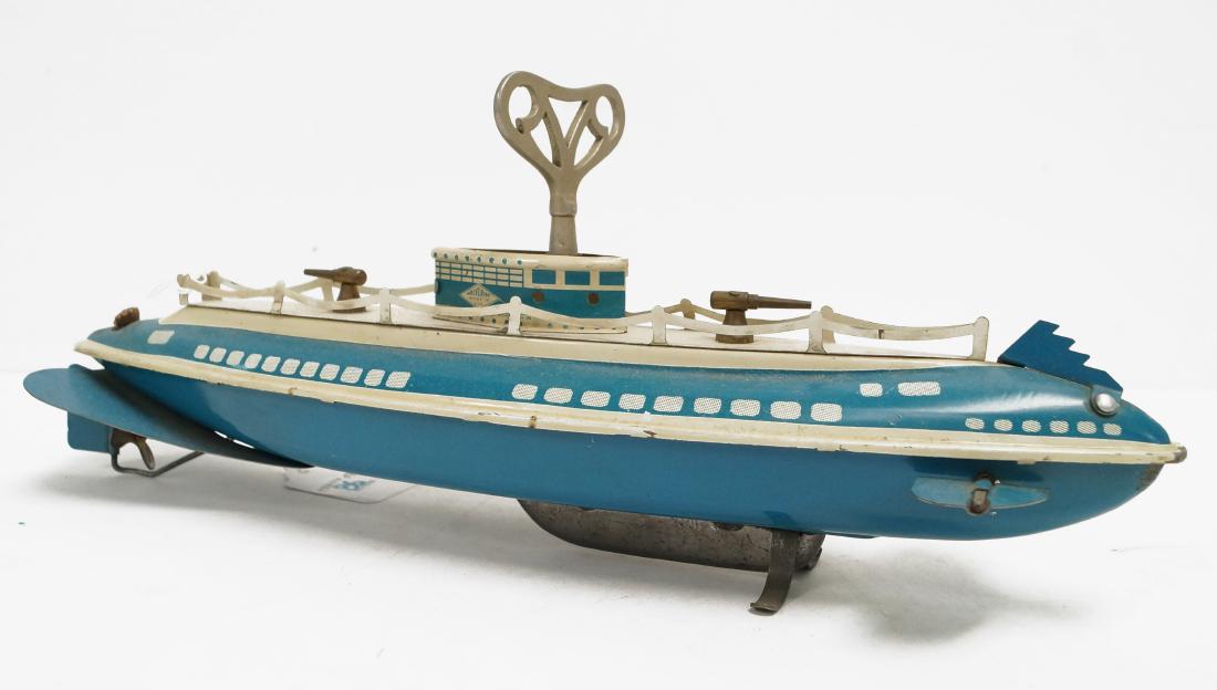 VINTAGE WOLVERINE, CLOCKWORK LITHO TIN SUBMARINE. (1 of 2)