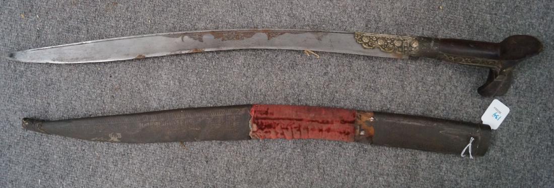 ANTIQUE TURKISH SWORD WITH CARVED WOOD/BRONZE HANDLE: ANTIQUE TURKISH SWORD WITH CARVED WOOD/BRONZE HANDLE AND TOOLED METAL SCABBARD. LENGTH 31"