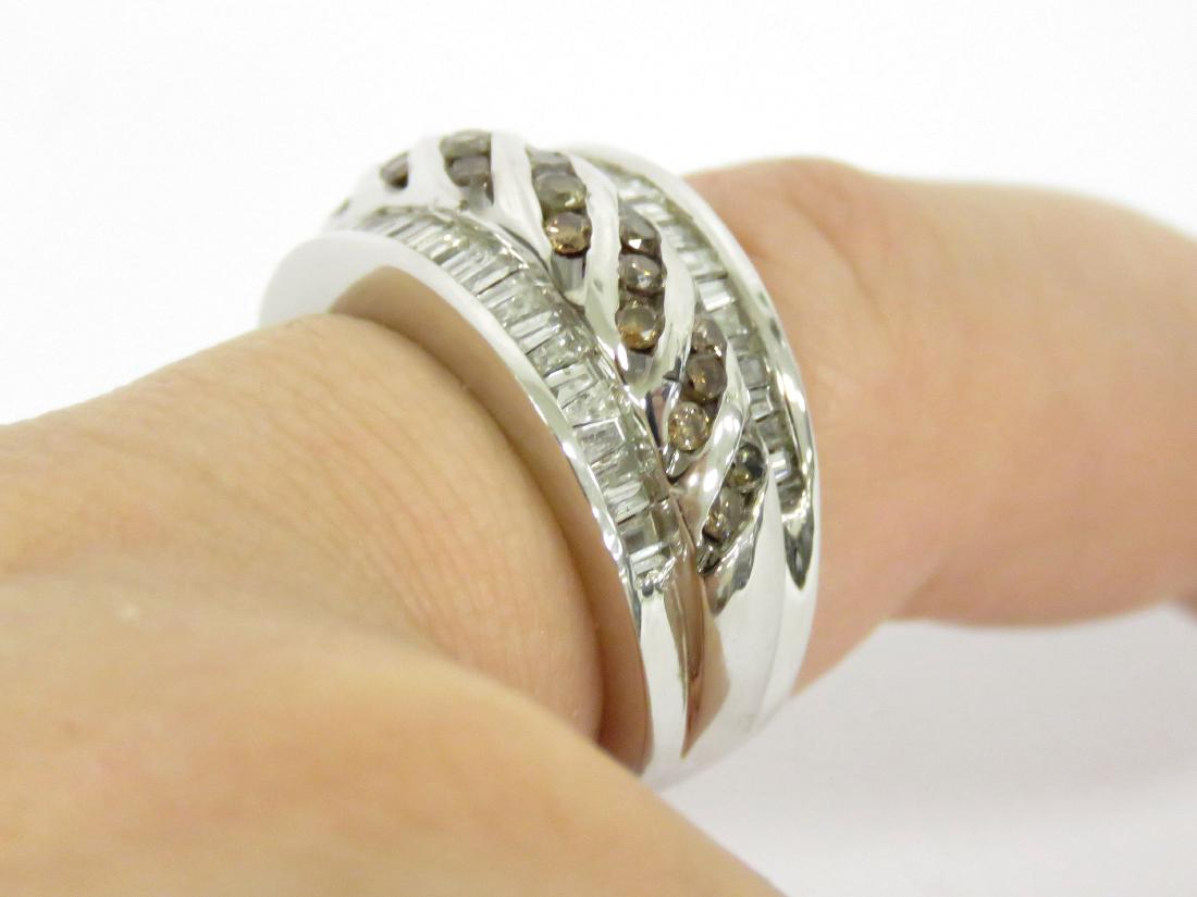 14K WHITE GOLD AND CHOCOLATE/WHITE DIAMOND WEDDING: 14K WHITE GOLD AND CHOCOLATE/WHITE DIAMOND WEDDING BAND, CHOCOLATE ROUND DIAMONDS WEIGH APPROXIMATELY 0.30 CT; (48) WHITE TAPERED DIAMONDS WEIGH APPROXIMATELY 1.20 CT. RING SIZE 6; GROSS WEIGHT 10.17