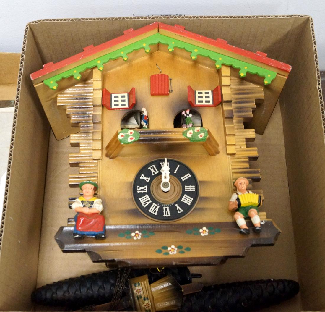 GERMAN BLACK FOREST CARVED CUCKOO CLOCK. HEIGHT 11" (1 of 1)