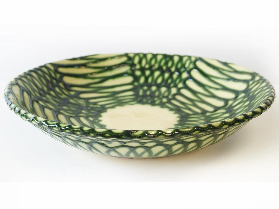 PROF. MAX LAUGER (GERMAN 1864-1952), FOR TONWERKE: PROF. MAX LAUGER (GERMAN 1864-1952), FOR TONWERKE KANDERN KERAMIK, GLAZED EARTHENWARE CHARGER, SIGNED. DIAMETER 12 5/8"