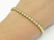 ITALIAN 18K YELLOW GOLD FLAT BEADED CHAIN BRACELET.