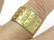 750 BURNISHED YELLOW GOLD BAND SET WITH (42) 1.0MM