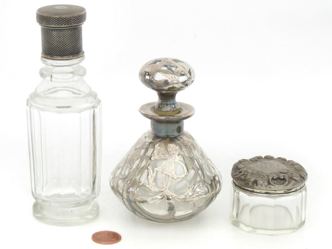 LOT (3) SILVER CAPPED DRESSER JARS AND OVERLAY PERFUME.: LOT (3) SILVER CAPPED DRESSER JARS AND OVERLAY PERFUME. LARGEST/HEIGHT 5 1/2" (STOPPER AND GLASS BOTTLE/AS IS)