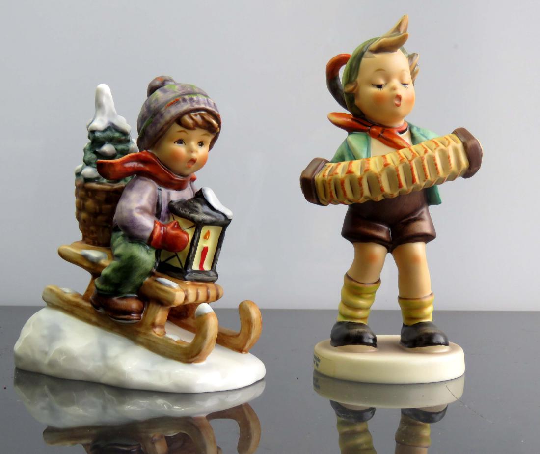 LOT (2) GOEBEL HUMMEL PORCELAIN FIGURINES INCLUDING: LOT (2) GOEBEL HUMMEL PORCELAIN FIGURINES INCLUDING "ACCORDION BOY", #849 AND "RIDE INTO CHRISTMAS", #727. HEIGHT 5" & 4 1/4" (WITH ORIGINAL BOXES)