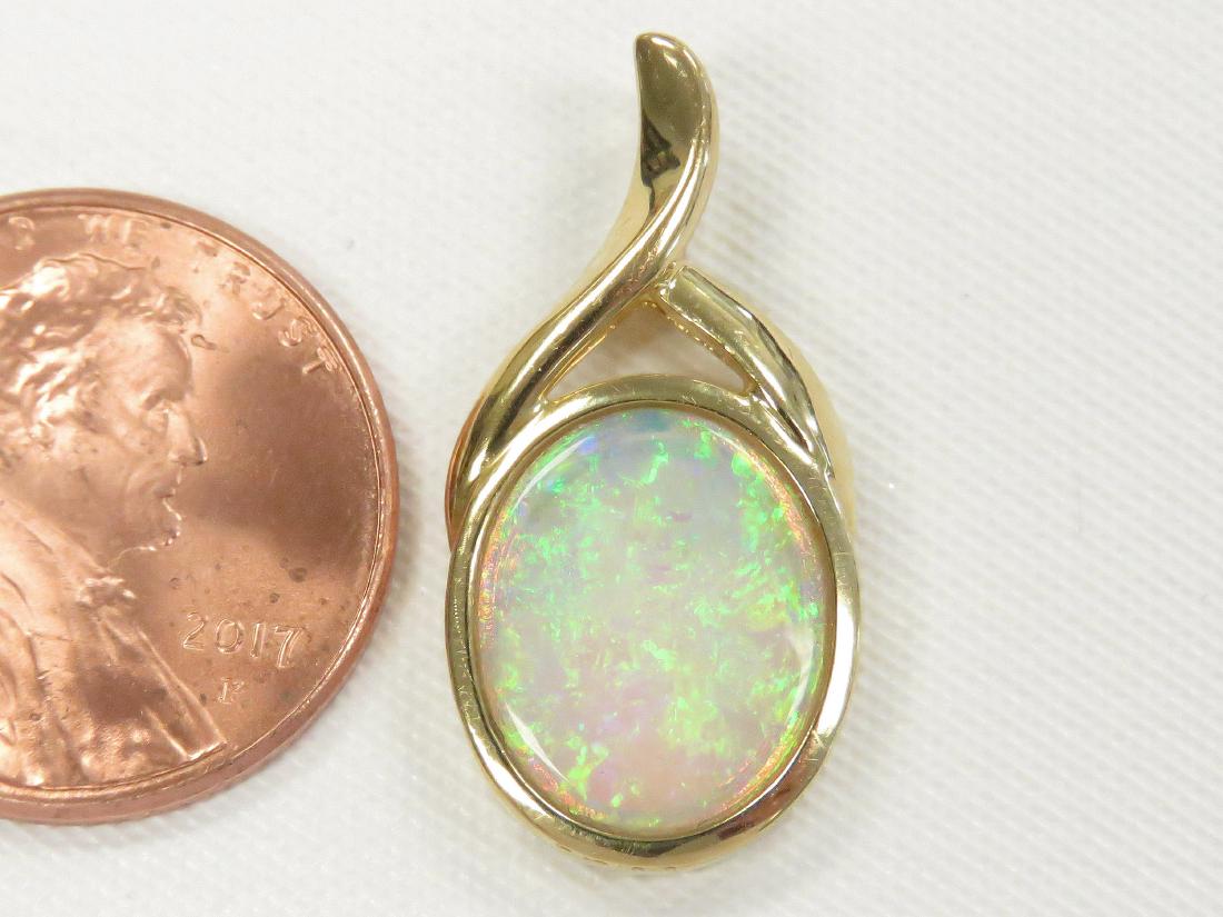 18K/750 YELLOW GOLD AND OPAL PENDANT. LENGTH 1"; GROSS (1 of 1)